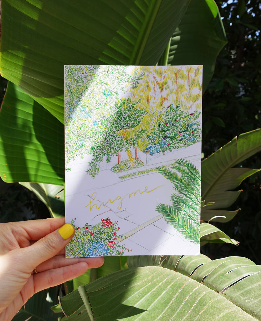 color pencil illustration of plants on a greeting card that says hug me